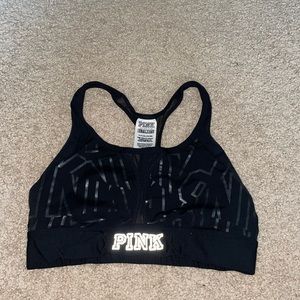 Pink Victoria’s Secret sports bra